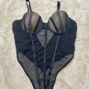 Sheer adjustable spaghetti strap bodysuit.